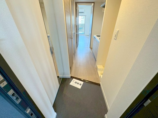 プレサンスOSAKA三国ネオスの玄関
