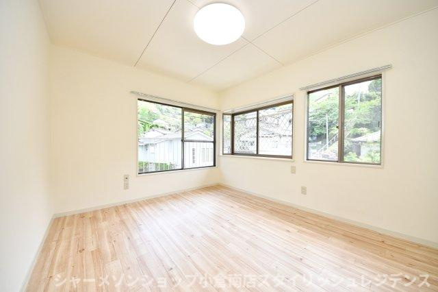 妙見町4番11号貸家の寝室