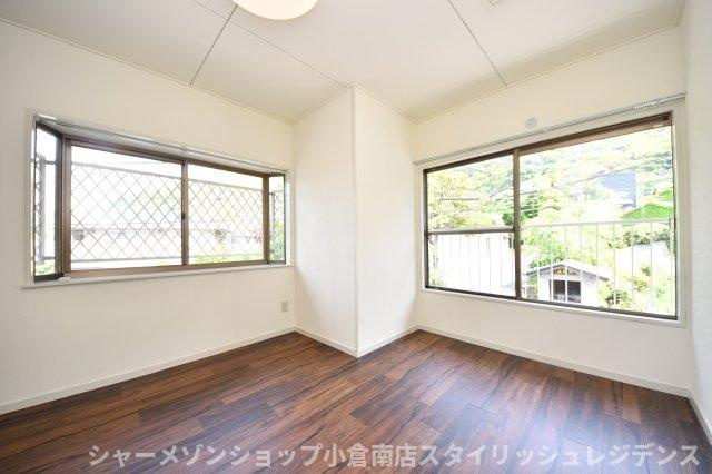 妙見町4番11号貸家の寝室