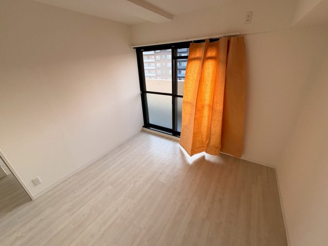 OMマンション東生駒の洋室