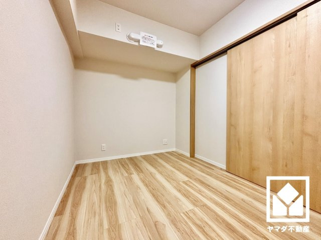 コープ野村京都南の寝室