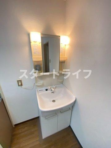 大阪市東淀川区下新庄１丁目の賃貸マンションの洗面所