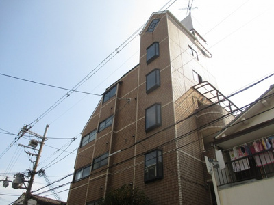 【外観】 | 豊里グランドハイツ | 建物の個性を主張するシックな外観です