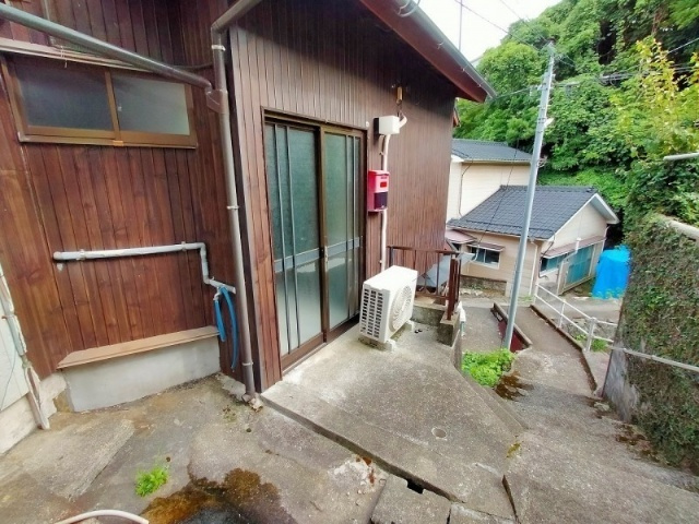  越智貸家（１Ｋタイプ）のエントランス