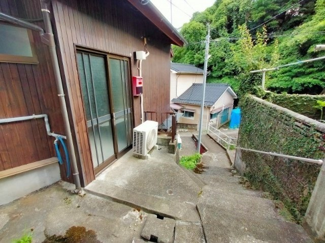  越智貸家（１Ｋタイプ）のエントランス