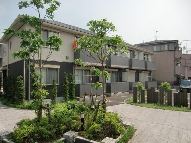東屋　輝