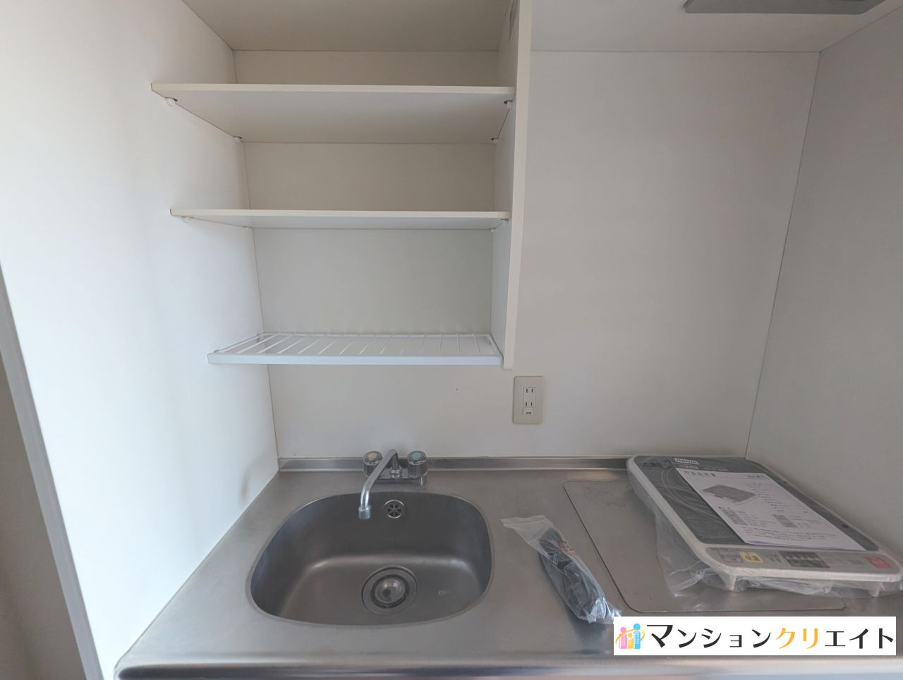 信開トピア足羽のキッチン|シンク上部に棚付き