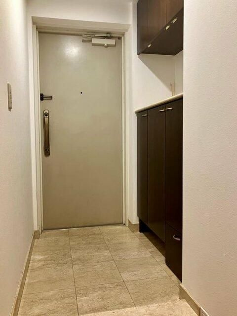 コスモ町屋ロイヤルフォルムの玄関