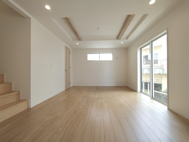 ブルーミングガーデン豊見城市豊見城4号棟の居間・リビング