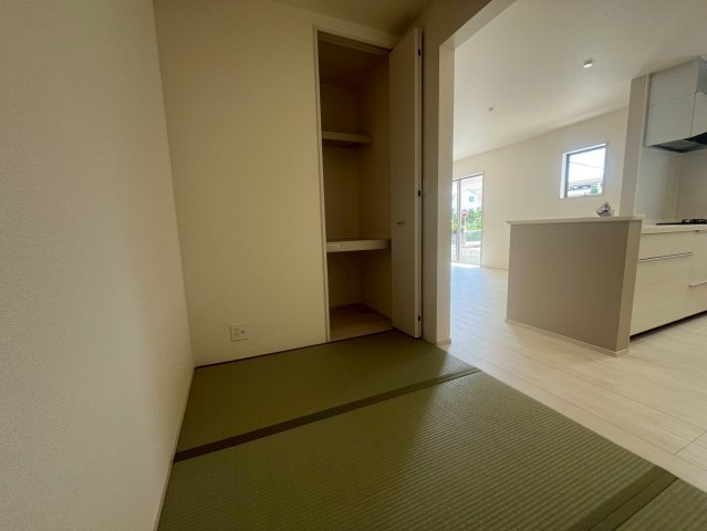 うるま市前原新築戸建て 1号棟（全10棟）の和室|LDKと仕切りのない和室