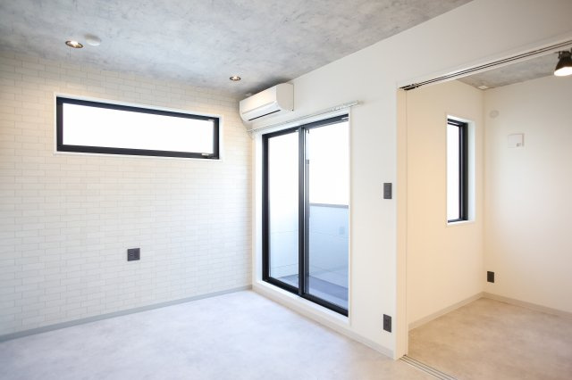 福岡市博多区三筑２丁目のアパートの居間・リビング|写真は類似です。