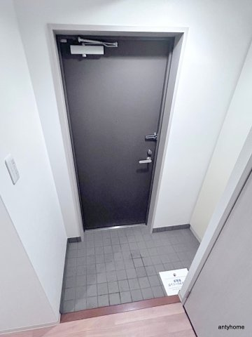 パセオ十三東　仲介手数料無料の玄関