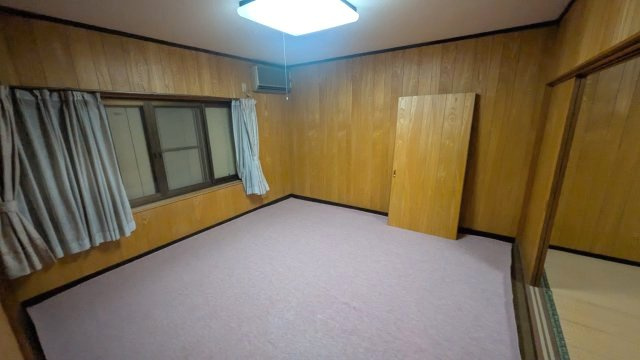 ６６５３９　岐阜市一日市場北町中古戸建ての洋室
