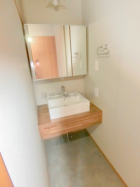 西蒲田3丁目戸建の洗面所|1階洗面所