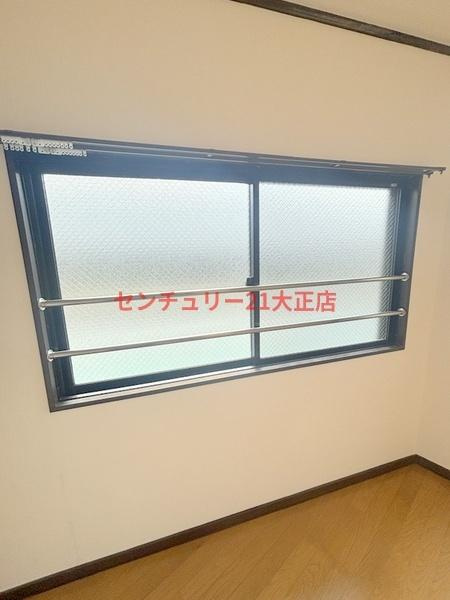 大阪市港区南市岡３丁目の賃貸マンションの洋室