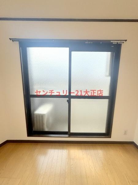 大阪市港区南市岡３丁目の賃貸マンションの洋室