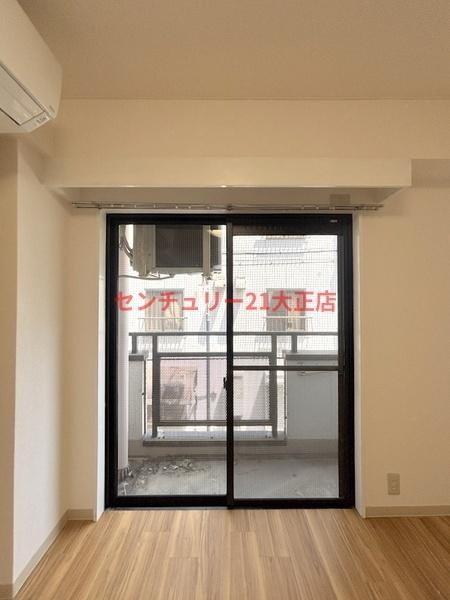 大阪市港区市岡元町３丁目の賃貸マンションの洋室