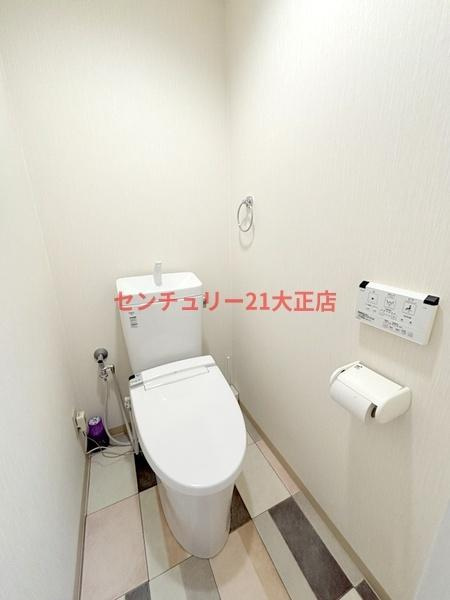 大阪市港区市岡元町３丁目の賃貸マンションのトイレ
