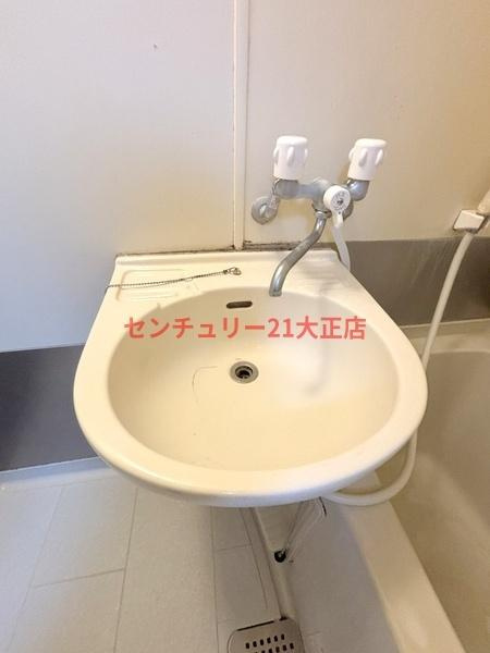 大阪市港区市岡元町３丁目の賃貸マンションの洗面所