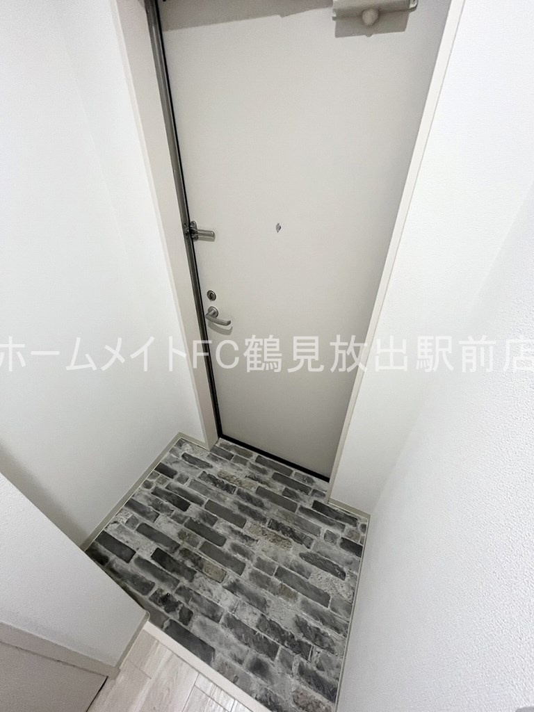 大阪市鶴見区横堤２丁目のアパートの玄関