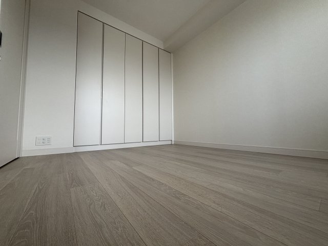 グランドメゾン新梅田タワー THE CLUB RESIDENCEの寝室
