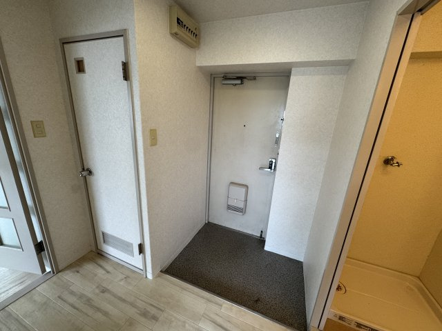 新千里ハイツこうじの玄関