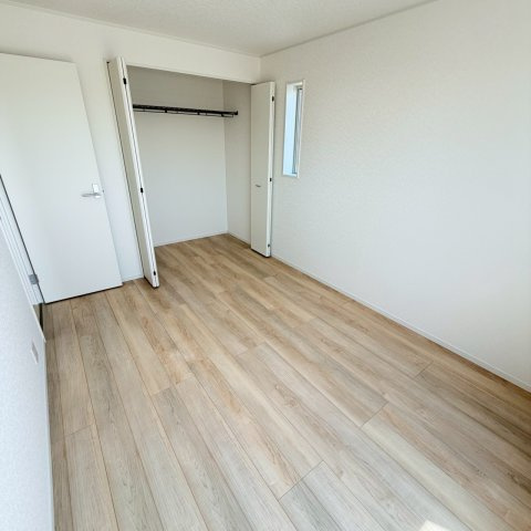 クレイドルガーデン松山市ひばりケ丘 第1の洋室