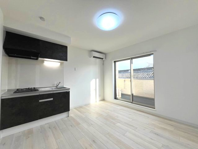 ジーメゾン寝屋川秦町ルシェールの居間・リビング