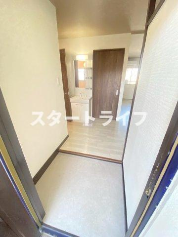 大阪市淀川区加島３丁目の賃貸マンションの玄関