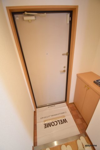 サン・ドミール　仲介手数料無料の玄関