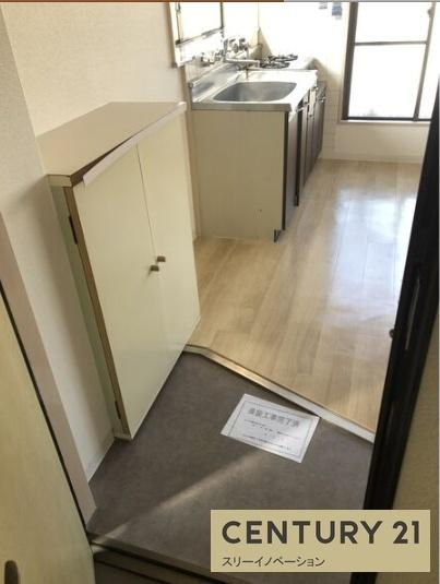 大阪市港区市岡元町２丁目の賃貸マンションの玄関