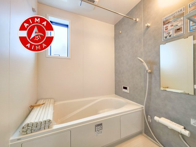 福津市西福間3丁目第5-2棟（2号棟）の内観：施工例|1日の疲れを癒してくれる広々バスルーム。雨の日のお洗濯にも大活躍な浴室乾燥機付です！