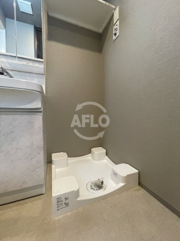 ファーストフィオーレ難波クレシアの洗面所|ファーストフィオーレ難波クレシア　洗濯機置場