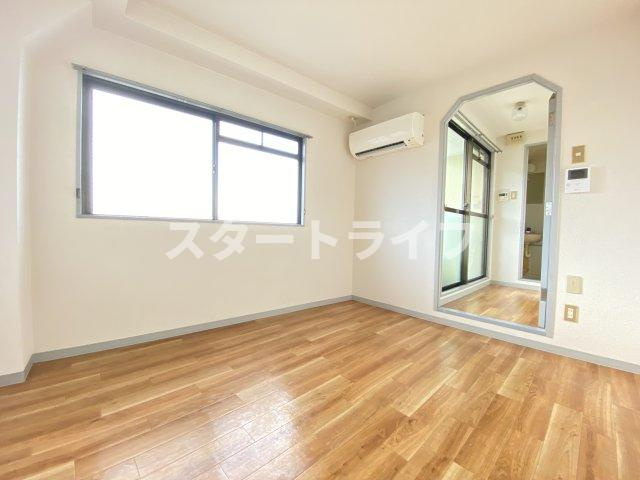 大阪市淀川区木川西２丁目の賃貸マンションの寝室