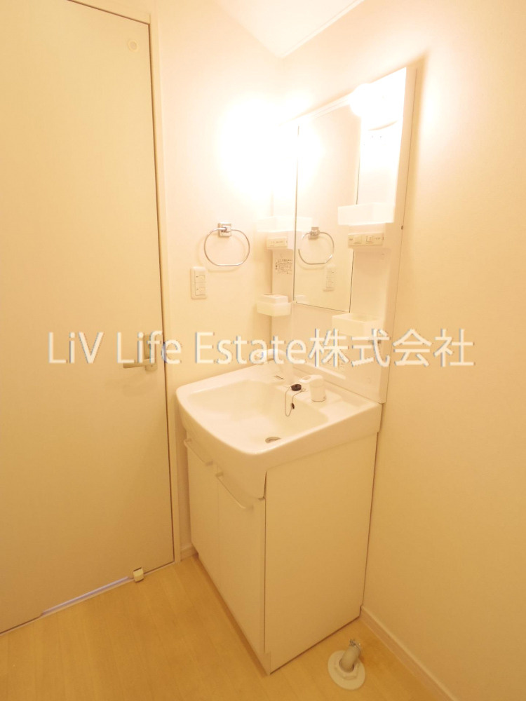 東村山市萩山町１丁目のアパートの洗面所