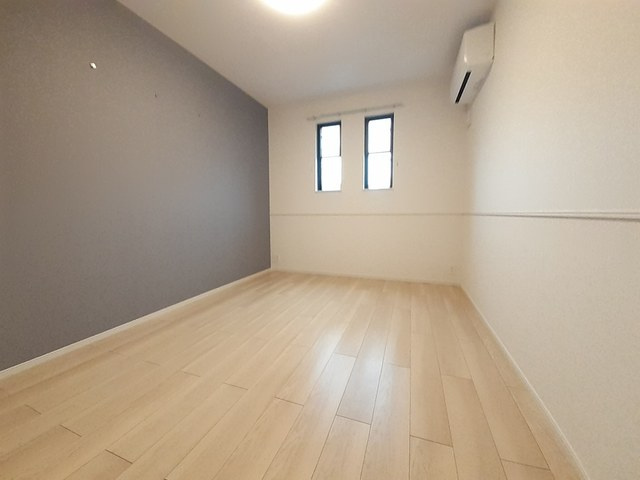 稲城市百村のアパートの寝室