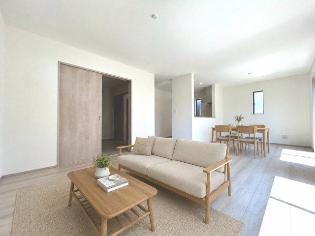 ハートフルタウン　一宮市北方町北方81番　全2区画分譲の居間・リビング|※AIイメージ画像　フローリング材には木目調で木材特有の風合いがあり、ナチュラルな美しさになっています。