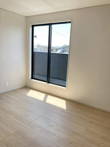 クレイドルガーデン松山市北吉田町 第2の洋室