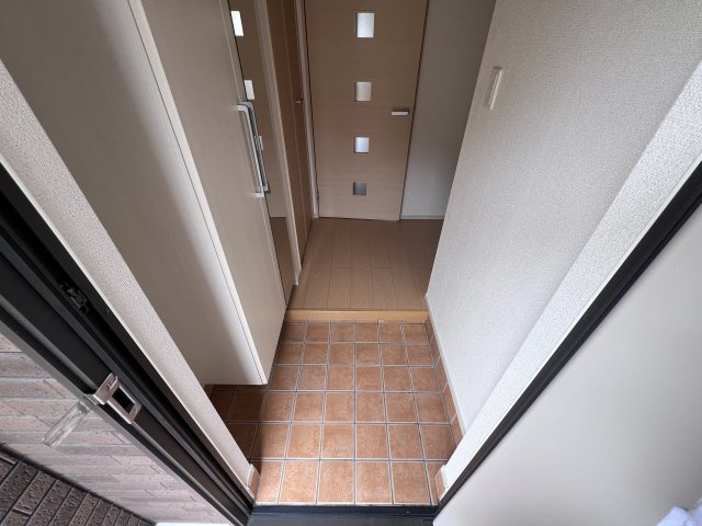 コスモグレイスＢの玄関