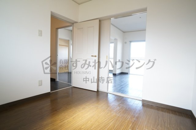 プランドール宝塚の寝室