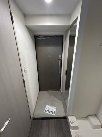 プレサンス塚本ベラビィの玄関