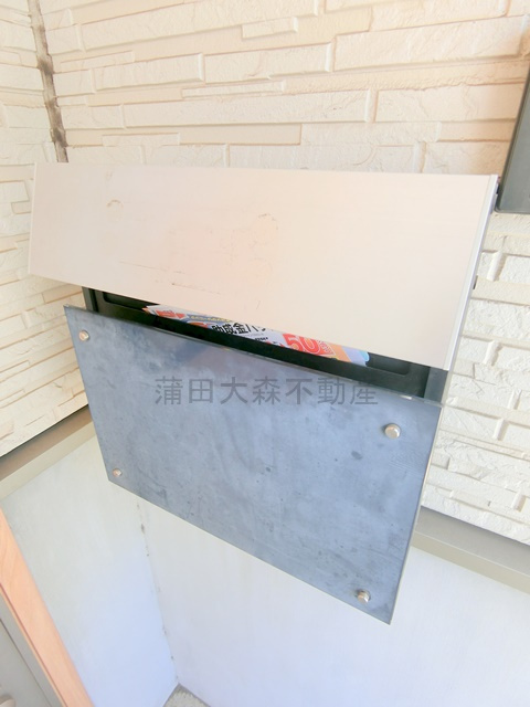 池上３丁目貸家の玄関