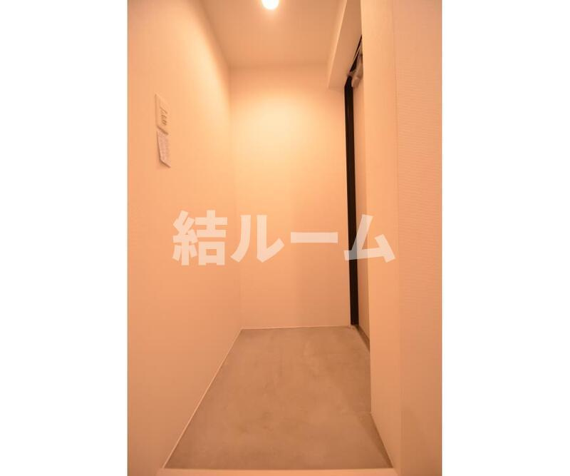北区王子本町１丁目の賃貸マンションの玄関