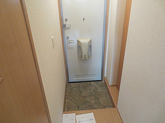 レセンテ梅が丘の玄関