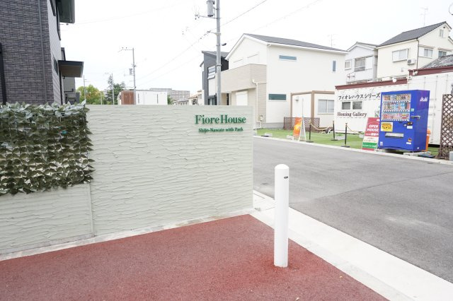 売土地　四條畷市美田町27号地（建築条件無し更地）の前面道路含む現地写真