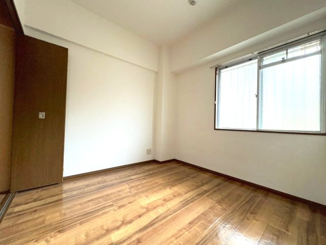 コンフォート津々山台の洋室
