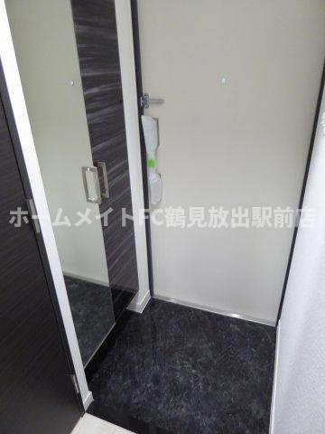 大阪市東成区深江北２丁目の賃貸マンションの玄関