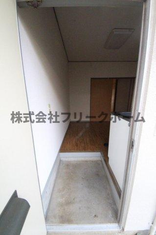 コーポ久納の玄関