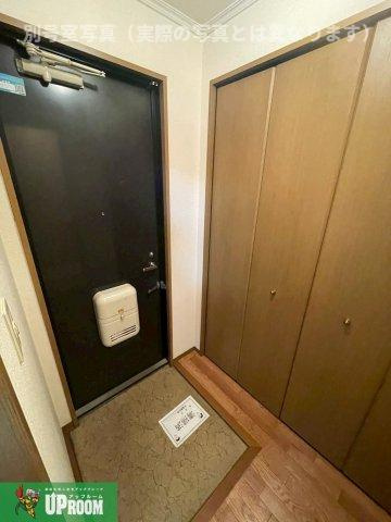 トゥインクルコート畔Bの玄関