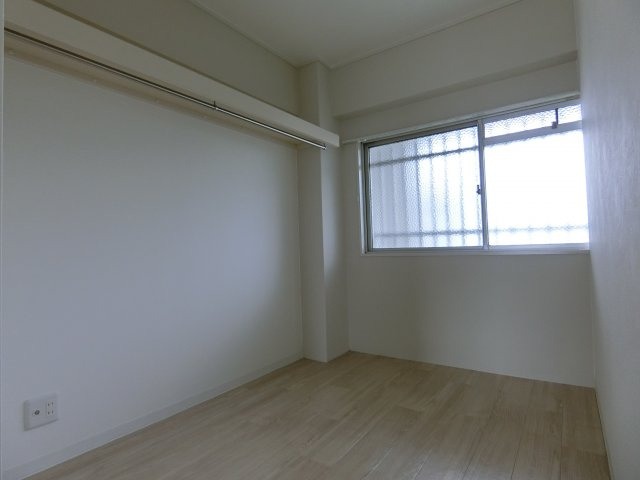 ハイツ春日野の寝室